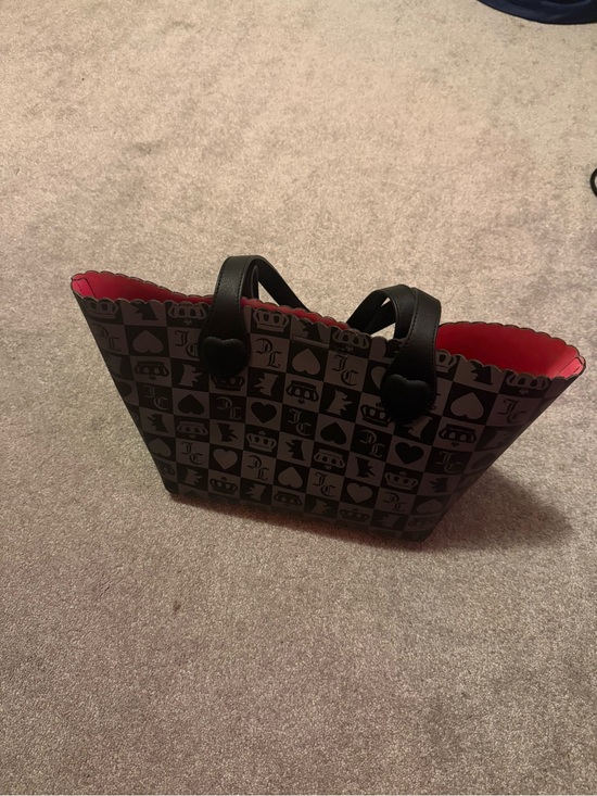Juicy Couture Handbags - Juicy couture Black Tote with hot pink Interior and Heart-Accent Handles
